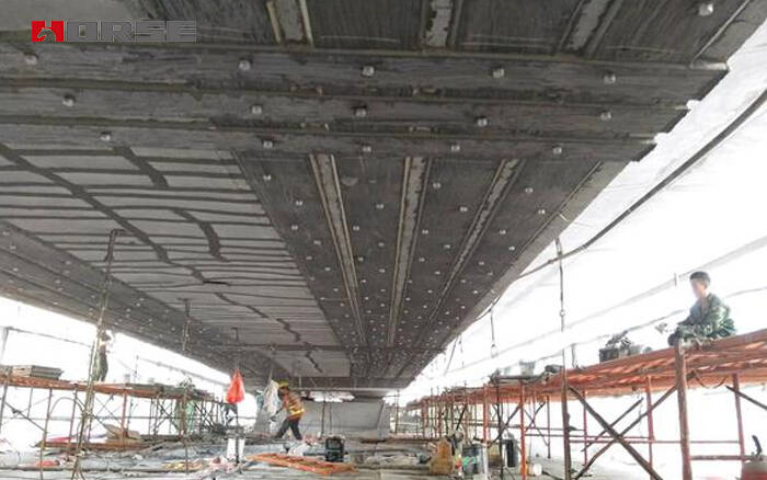 Brdge retrofitting--reinforcing by steel plate