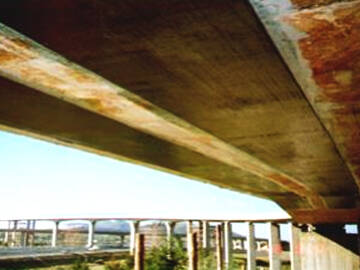 Flexural reinforcement of concrete bridge deck reinforced by CFRP sheet