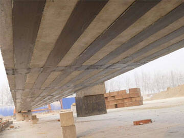 Application of strengthening beam bridge with carbon fiber plates